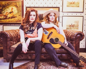 Celtic Christmas Musicians posing with guitar