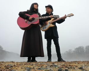 The Kennedys Photo of THe Kennedys holding guitars